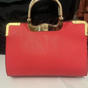 Elegant Coral Pink Handbag with Gold Accents